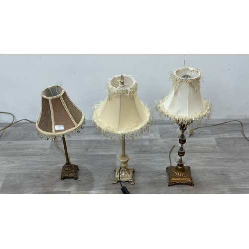 151 - Three modern Rococo style resin table lamps with fabric shades - largest approx. 63cm high