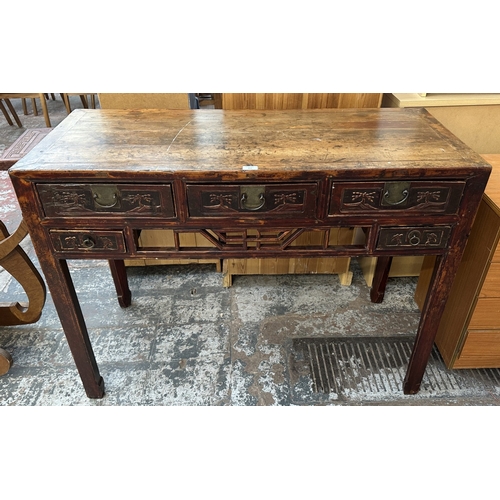 153 - An antique Chinese lacquered carved hardwood console/altar table - approx. 88cm high x 120cm wide x ... 