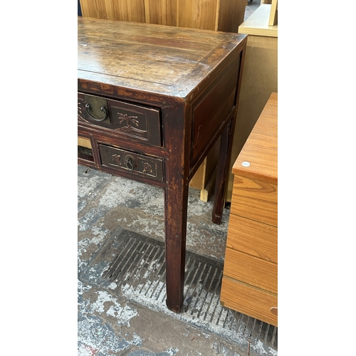 153 - An antique Chinese lacquered carved hardwood console/altar table - approx. 88cm high x 120cm wide x ... 