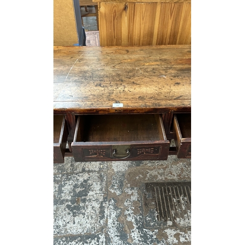 153 - An antique Chinese lacquered carved hardwood console/altar table - approx. 88cm high x 120cm wide x ... 