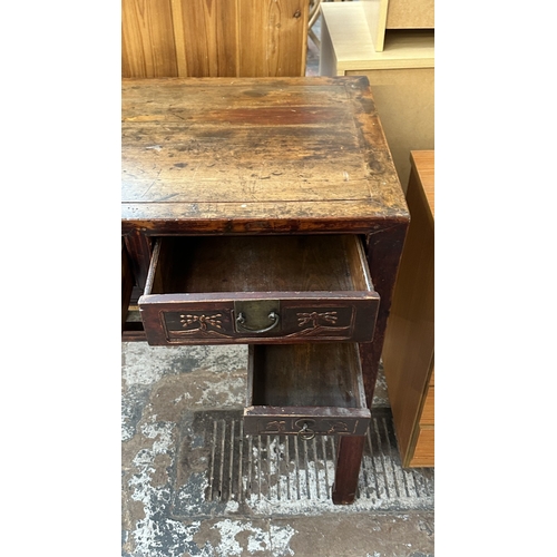 153 - An antique Chinese lacquered carved hardwood console/altar table - approx. 88cm high x 120cm wide x ... 