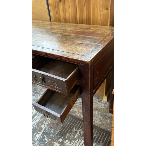 153 - An antique Chinese lacquered carved hardwood console/altar table - approx. 88cm high x 120cm wide x ... 