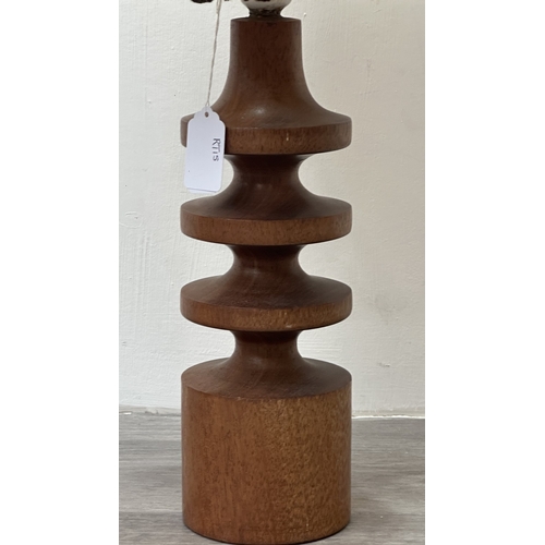 161 - A mid 20th century teak table lamp with brown and beige fabric shade - approx. 66cm high including s... 
