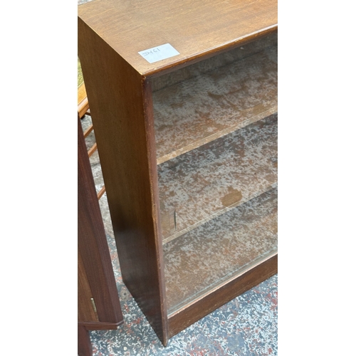 162 - A mid 20th century Herbert E. Gibbs teak bookcase with two glass sliding doors - approx. 83cm high x... 