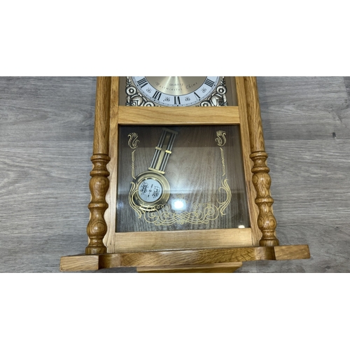 166 - Two items, one late 19th/early 20th century carved mahogany cased aneroid barometer and one late 20t... 