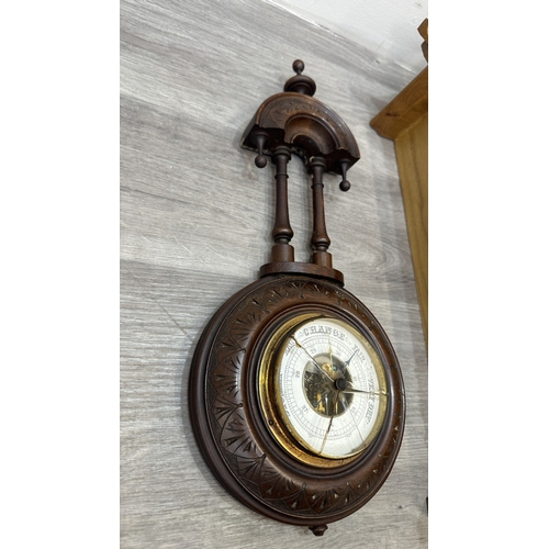 166 - Two items, one late 19th/early 20th century carved mahogany cased aneroid barometer and one late 20t... 