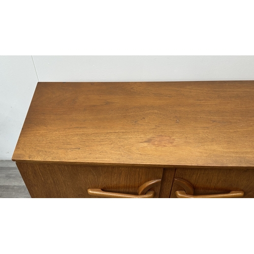 167 - A mid 20th century Beautility teak sideboard - approx. 76cm high x 184cm wide x 48cm deep