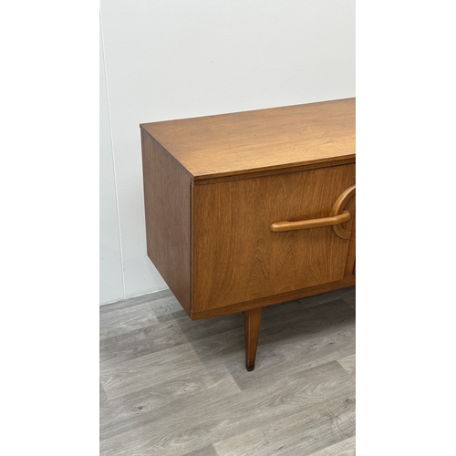 167 - A mid 20th century Beautility teak sideboard - approx. 76cm high x 184cm wide x 48cm deep