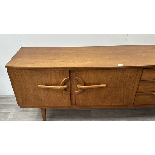 167 - A mid 20th century Beautility teak sideboard - approx. 76cm high x 184cm wide x 48cm deep