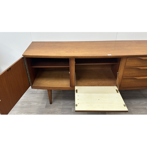 167 - A mid 20th century Beautility teak sideboard - approx. 76cm high x 184cm wide x 48cm deep