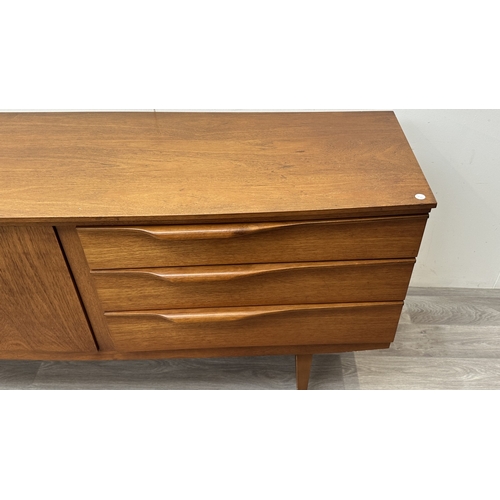 167 - A mid 20th century Beautility teak sideboard - approx. 76cm high x 184cm wide x 48cm deep