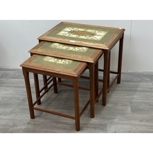 169 - A mid 20th century Danish teak and tiled top nest of three tables - approx. 48cm high x 55cm wide x ... 