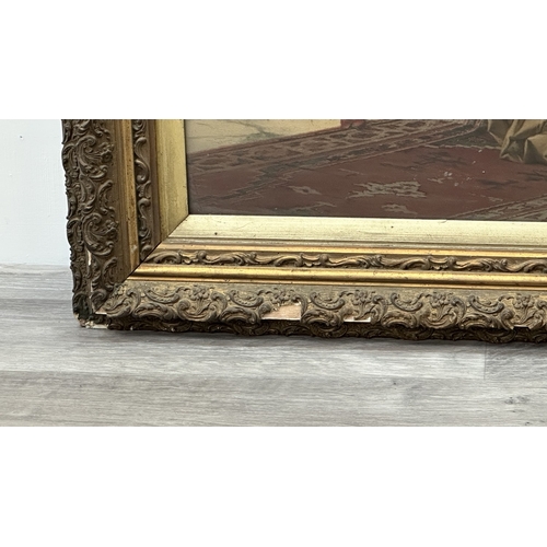 172 - A late 19th/early 20th century gilt framed Konrad Kiesel (1846-1921) 'The Mandolin Player' print - a... 