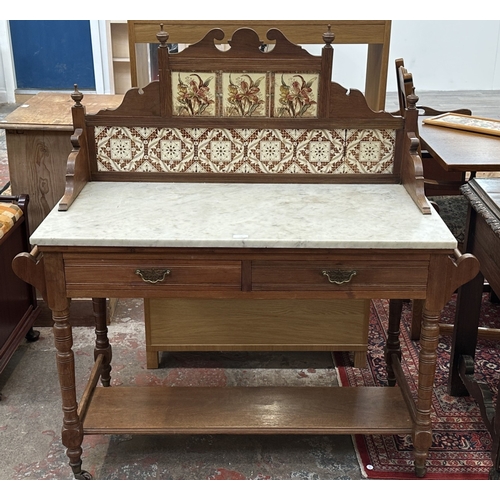 177 - An Edwardian walnut and marble top washstand with ceramic tile splashback - approx. 121cm high x 120... 