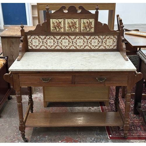 177 - An Edwardian walnut and marble top washstand with ceramic tile splashback - approx. 121cm high x 120... 
