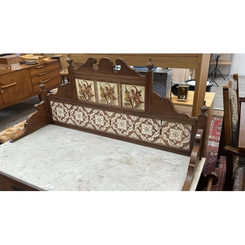 177 - An Edwardian walnut and marble top washstand with ceramic tile splashback - approx. 121cm high x 120... 