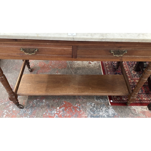 177 - An Edwardian walnut and marble top washstand with ceramic tile splashback - approx. 121cm high x 120... 
