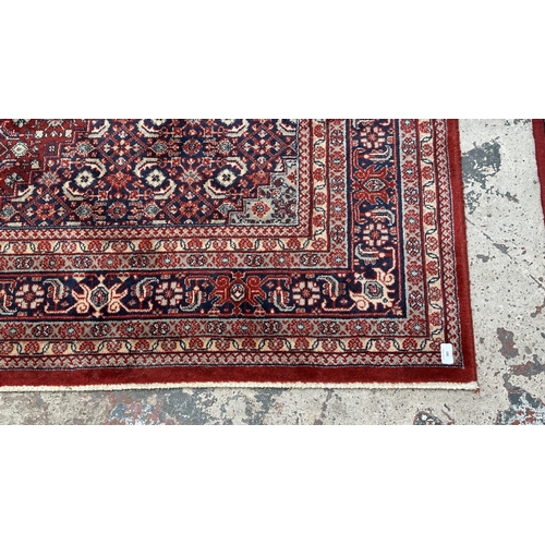 183 - A Hand Made Carpets Ltd. Royal Keshan 100% wool rug with hand knotted fringes - approx. 300cm x 200c... 
