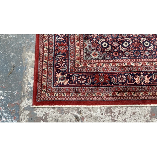183 - A Hand Made Carpets Ltd. Royal Keshan 100% wool rug with hand knotted fringes - approx. 300cm x 200c... 