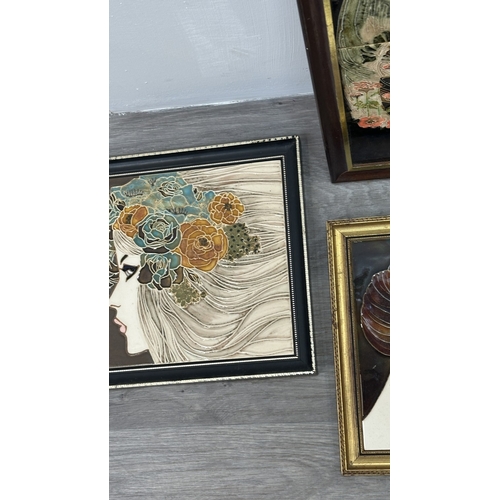194 - Four framed hand painted ceramic tubelined tile wall plaques, two Maw & Co. Art Nouveau style, one A... 
