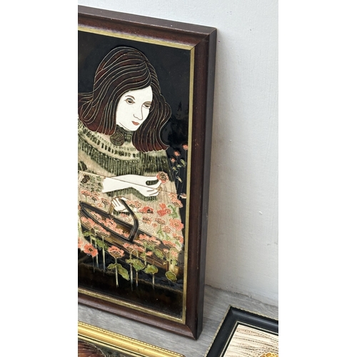 194 - Four framed hand painted ceramic tubelined tile wall plaques, two Maw & Co. Art Nouveau style, one A... 