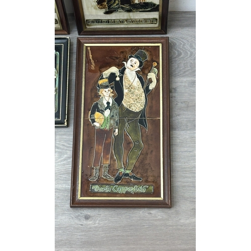 195 - Six framed hand painted ceramic tubelined tile wall plaques, one possibly by Maw & Co. depicting a p... 