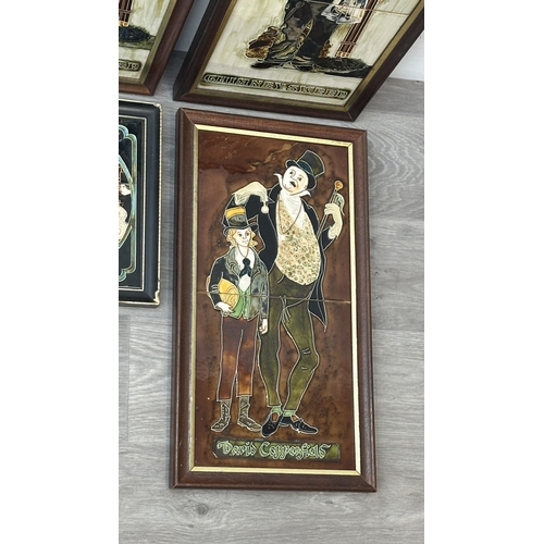 195 - Six framed hand painted ceramic tubelined tile wall plaques, one possibly by Maw & Co. depicting a p... 