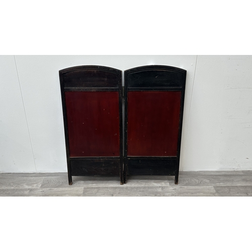 198 - A Chinese lacquered and carved wooden two section folding screen - approx. 91cm high x 86cm wide