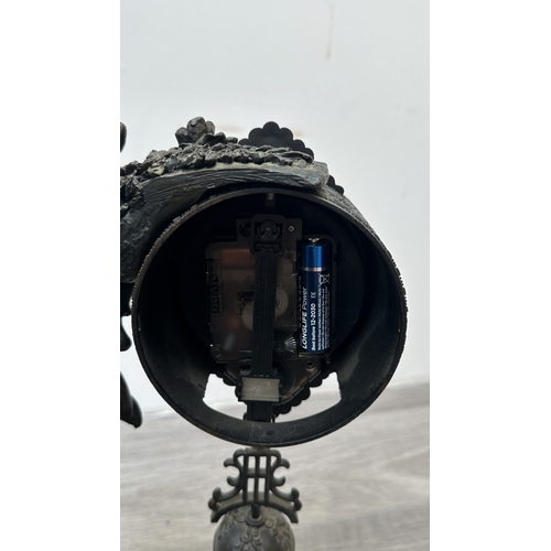 201 - Four resin cased quartz mantel clocks, one Academy bronzed, one WM. Widdop silver painted, one Rococ... 