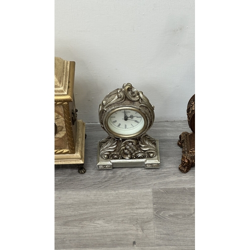 201 - Four resin cased quartz mantel clocks, one Academy bronzed, one WM. Widdop silver painted, one Rococ... 