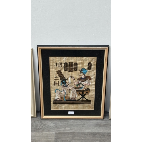 203 - Three framed Egyptian papyrus paintings - largest approx. 51cm high x 42cm wide