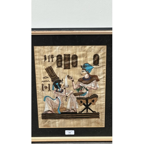 203 - Three framed Egyptian papyrus paintings - largest approx. 51cm high x 42cm wide