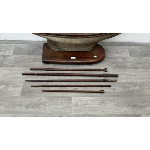 210 - An early 20th century scratch built wooden pond yacht on mahogany plinth - approx. 33cm high x 25cm ... 