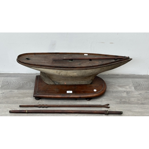 210 - An early 20th century scratch built wooden pond yacht on mahogany plinth - approx. 33cm high x 25cm ... 