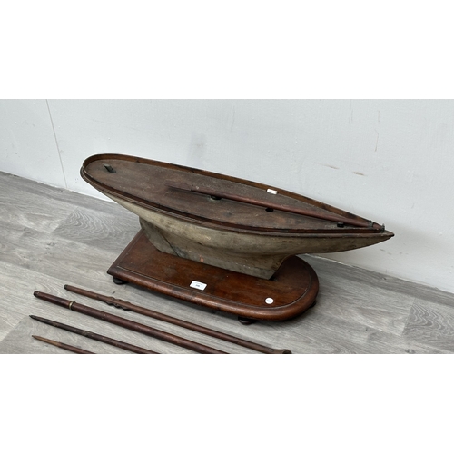 210 - An early 20th century scratch built wooden pond yacht on mahogany plinth - approx. 33cm high x 25cm ... 