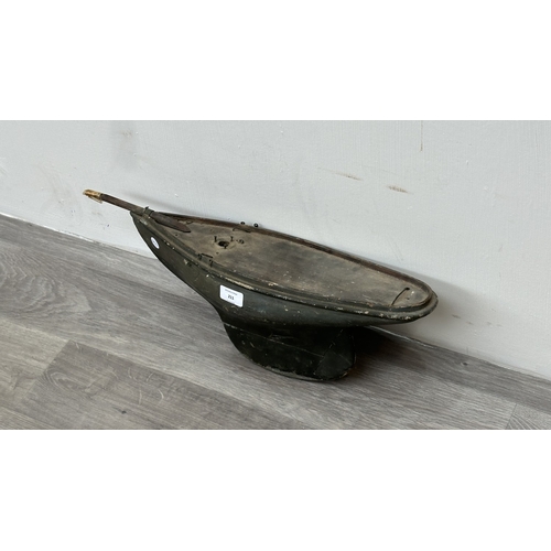 211 - An early 20th century green painted wooden pond yacht - approx. 21cm high x 16cm wide x 57cm long