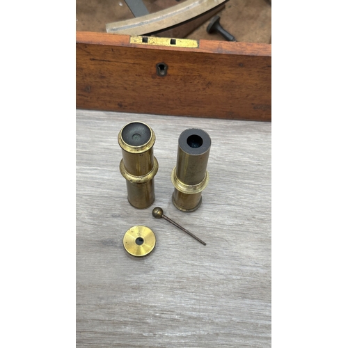 215 - An early 20th century mahogany cased maritime sextant signed W.T Parrott St. Andrew Dock Hull - case... 