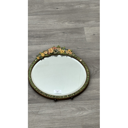 217 - Two early/mid 20th century Barbola hand painted floral decorated framed bevelled edge mirrors, one c... 