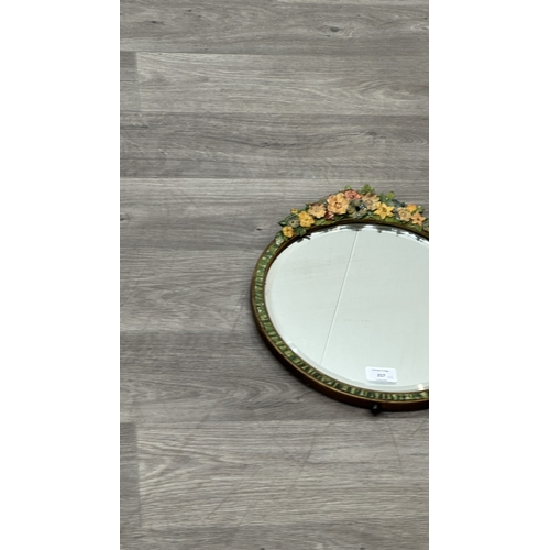 217 - Two early/mid 20th century Barbola hand painted floral decorated framed bevelled edge mirrors, one c... 