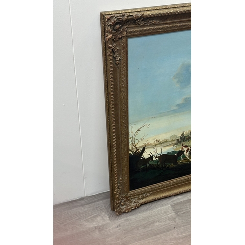 224 - A 20th century gilt framed oil on canvas after Dutch artist Aelbert Cuyp, titled 'A Hilly Landscape'... 