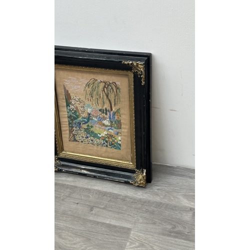 226 - A Victorian gilt and black lacquered framed embroidery depicting a peacock - approx. 54cm high x 47c... 