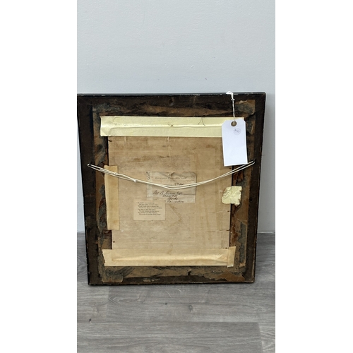 226 - A Victorian gilt and black lacquered framed embroidery depicting a peacock - approx. 54cm high x 47c... 