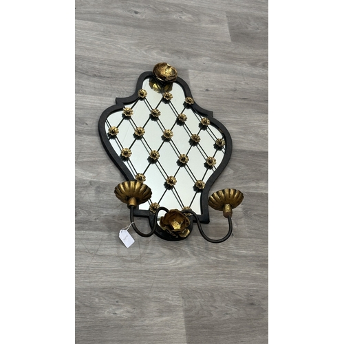234 - Two metal framed wall mirrors with floral decoration, one white painted - approx. 75cm high x 54cm w... 