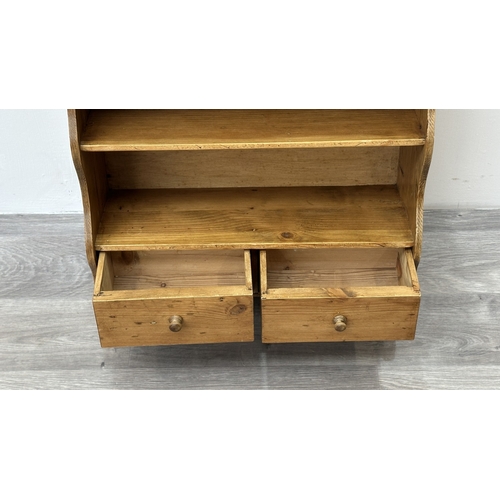 241 - A Victorian style pine wall hanging two tier shelving unit - approx. 58cm high x 50cm wide x 22cm de... 