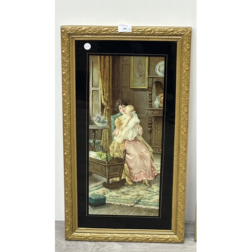 243 - Two late 19th/early 20th century gilt framed Eva Hollyer prints depicting mother and child - approx.... 