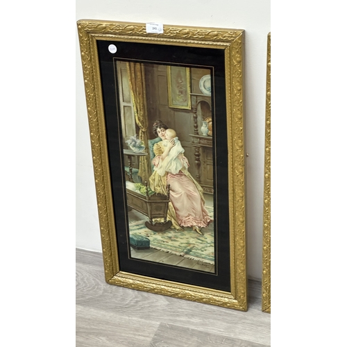 243 - Two late 19th/early 20th century gilt framed Eva Hollyer prints depicting mother and child - approx.... 