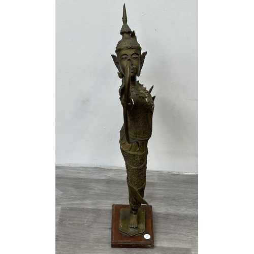 251 - A Thai bronze sculpture of Prince Rama on wooden plinth - approx. 65cm high