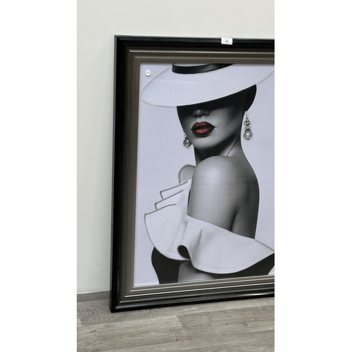 254 - A Milan03 liquid glitter portrait print, titled 'Red Lips and Pearls' - approx. 95cm high x 74cm wid... 