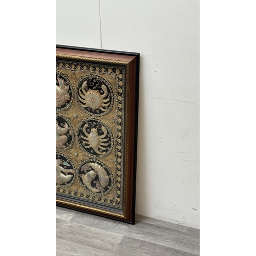 258 - A framed Asian kalaga tapestry - approx. 95cm high x 116cm wide