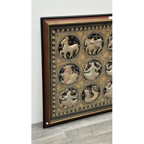 258 - A framed Asian kalaga tapestry - approx. 95cm high x 116cm wide